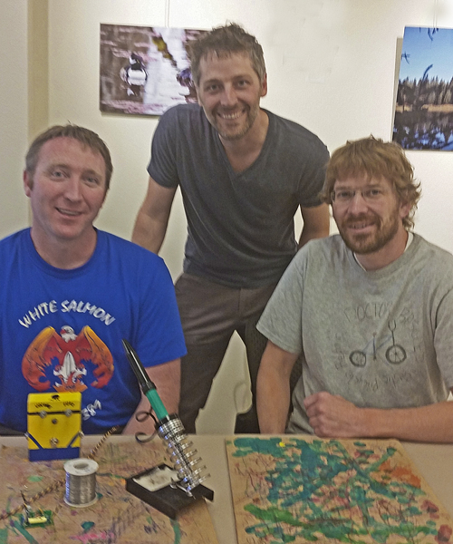 Volunteer Ryan Vansickle, (left) Repair Cafe organizer Turner Savard (center) and volunteer Justin Black. Photo: Suzanne Wright